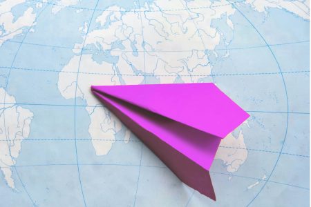 paper plane on a map